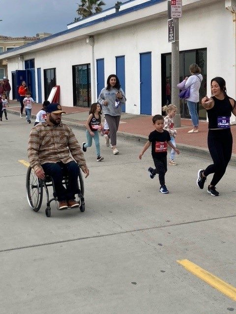 Ricky with kids at the Oceanside IronKids race